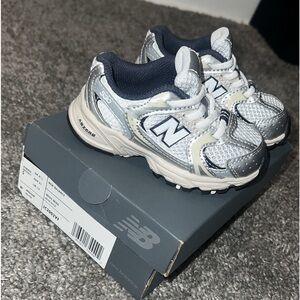 5C New Balance . worn once. In great condition 💙